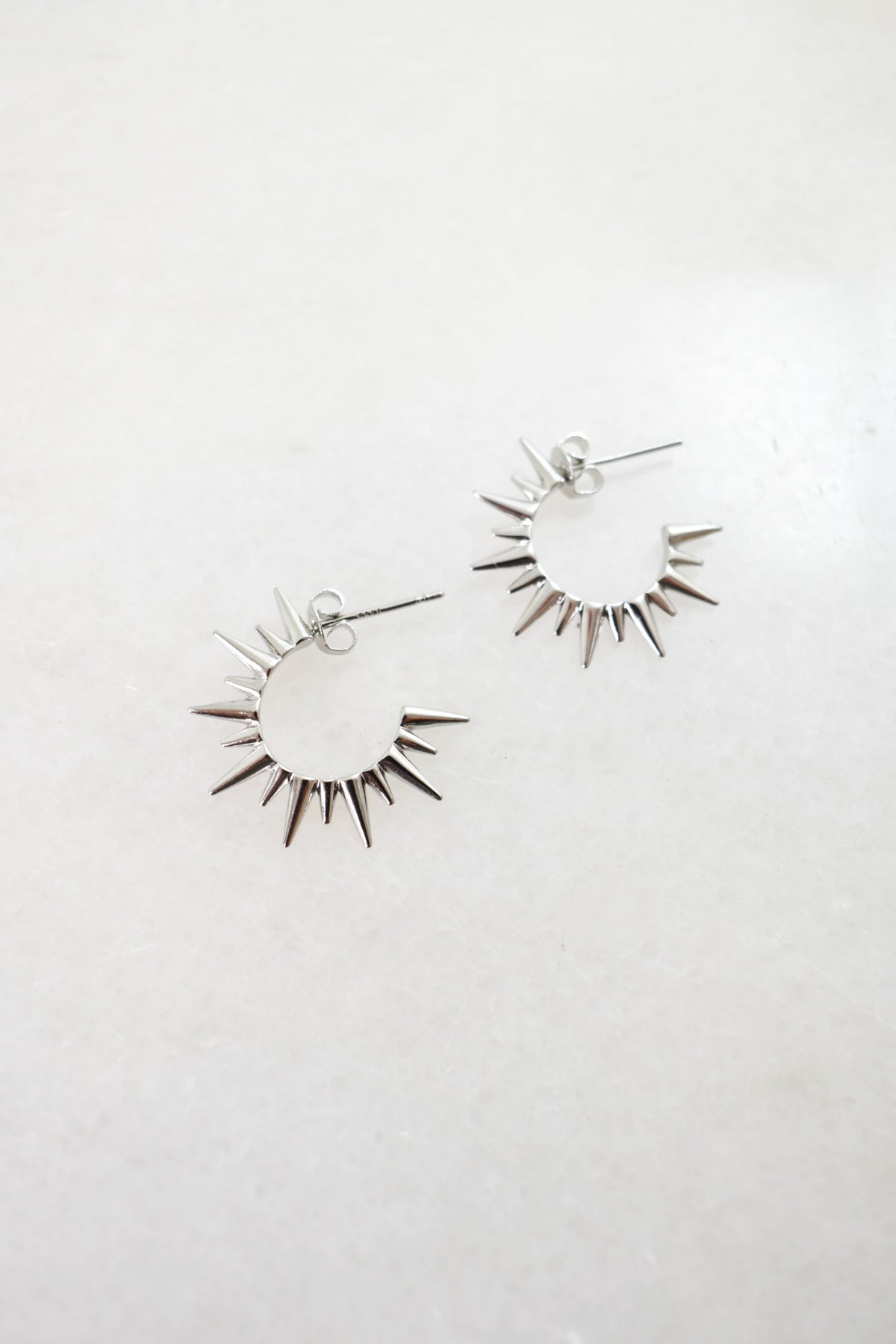 Spiked Huggie Earrings image 0