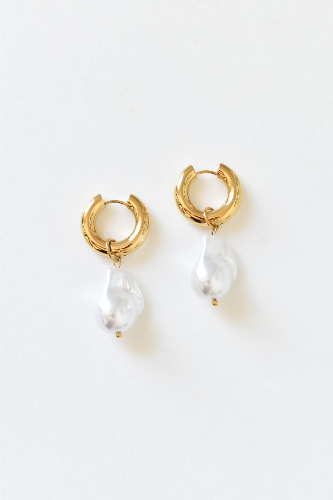 Pearl Huggie Earrings image 0